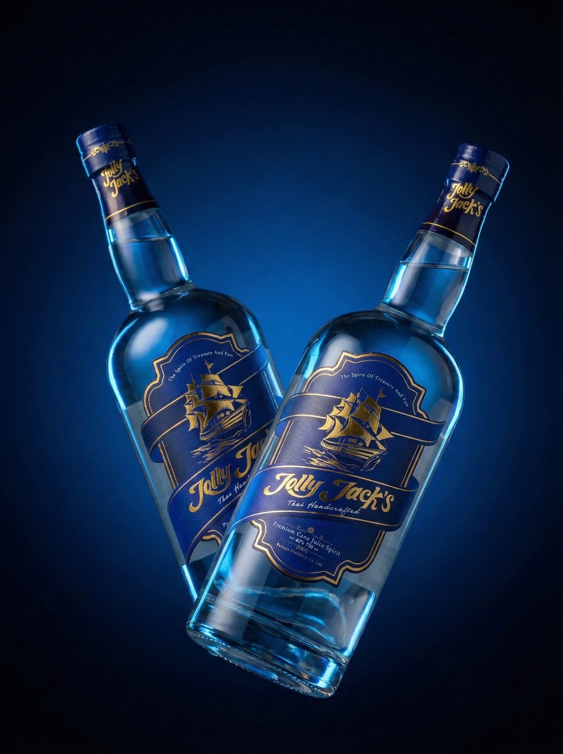 Jolly-Jacks-Premium-Cane-Juice-Spirit-Blue-Gold-Edition ขวดสุรา Jolly Jack's Thai Handcrafted Premium Cane Juice Spirit สองขวด ดีไซน์ฉลากสีน้ำเงินทองบนพื้นหลังสีน้ำเงินพรีเมียม
